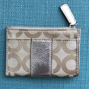 Gold canvas Coach card wallet